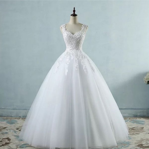 Bílé svatební šaty s perličkami 34/36 XS/S